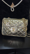CC metallic gold purse