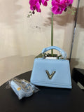 Lu epi twist top handle blue