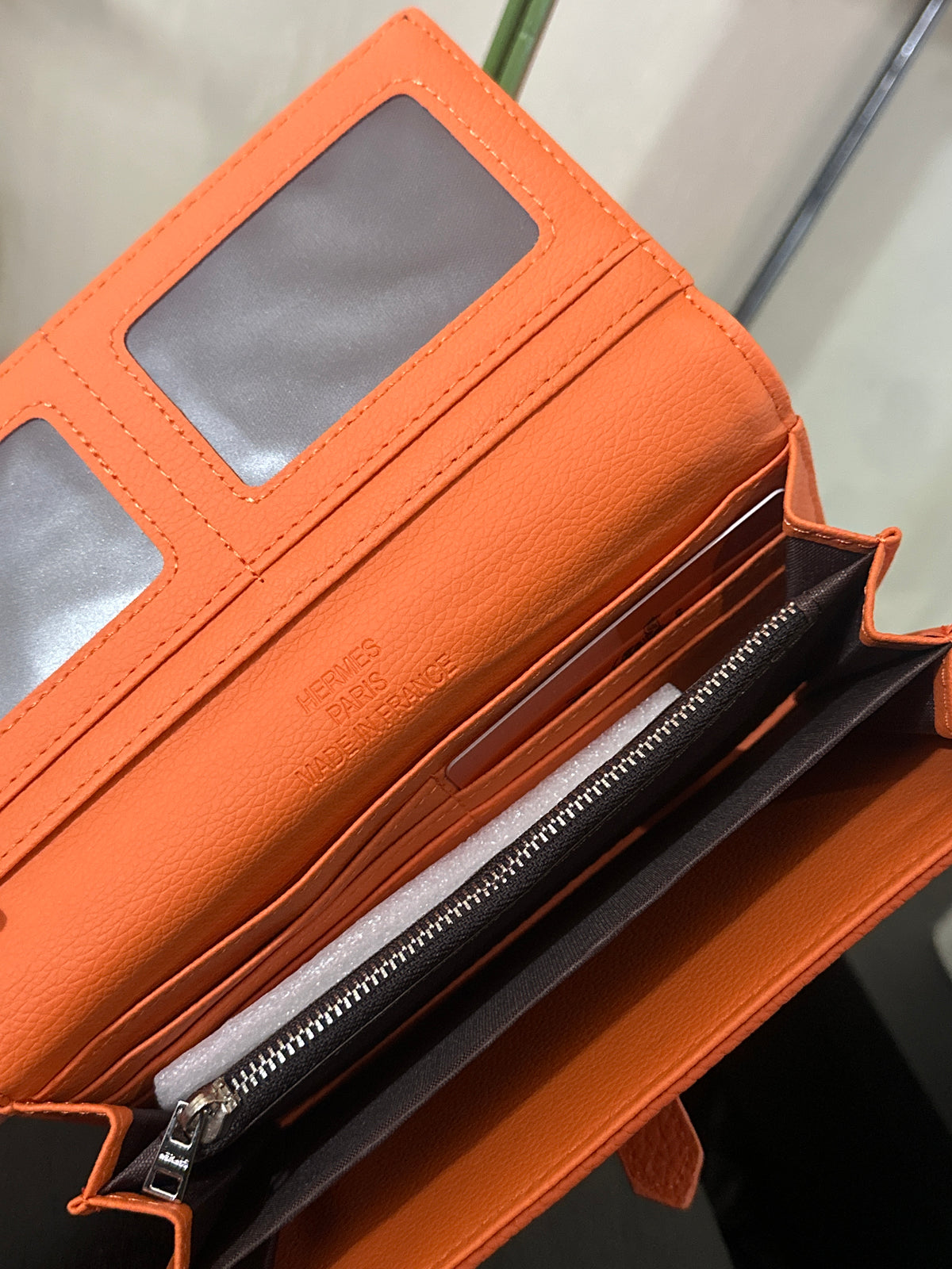 Hermes wallet tab orange